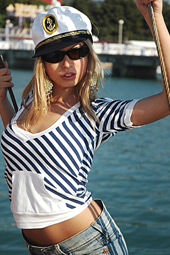 Nautical babe Julia loses her clothes while at the docks