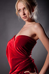 Big-boob babe tries on a few colors for the camera