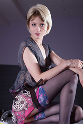 Bewitching and short haired blonde with small mammaries is showing her tits