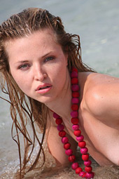 Water splashing session for the beautiful blond lady going solo