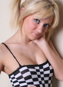 SpunkyAngels: Perky blonde Danielle Lynn exposes her perfect round ass while peeling off her skin tight bodysuit