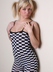 SpunkyAngels: Perky blonde Danielle Lynn exposes her perfect round ass while peeling off her skin tight bodysuit