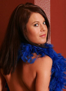 SpunkyAngels: Topless Spunky Angel Erin shows off in just a boa and blue panties