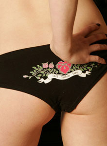 SpunkyAngels: Petite blonde Haley loves teasing as she strips out of her scarf and black panties