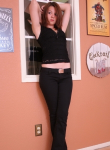 SpunkyAngels: Perky tease Kir shows off her tight round ass in a tiny thong as she gets topless