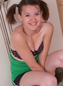 SpunkyAngels: Cute 18 year old Kir gets topless as she strips out of her star covered bra in the kitchen