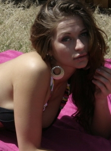 SpunkyAngels: Spunky Angels babe London Hart shows off her delicious curves in the sun as she strips out of her string bikini top