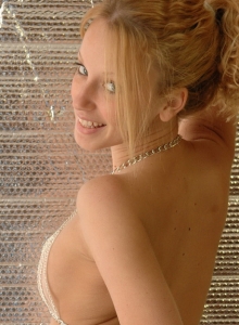 SpunkyAngels: Busty blonde tease Lucky shows off her big perky tits in a very revealing chain bikini that she strips out of