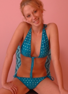SpunkyAngels: Busty blonde Lucky loves to tease with her perky 18 year old boobs as she strips out of her sparkly swim suit