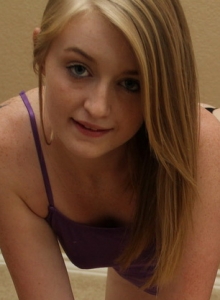 SpunkyAngels: Perky teen Mandy Roe teases in a skimpy purple tank top and black thong