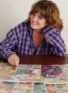 SpunkyAngels: Curvy nerdy tease Misty exposes her natural big tits as she shows off her comic book collection