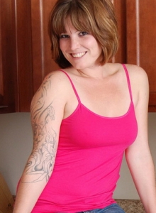 SpunkyAngels: Horny tease Misty shows off her playful teasing side as she strips naked in the kitchen