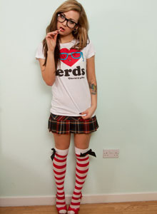 SpunkyAngels: Sexy nerd loving Natalia K. strips out of her short skirt and tshirt and teases with her blowjob skills on a lollipop