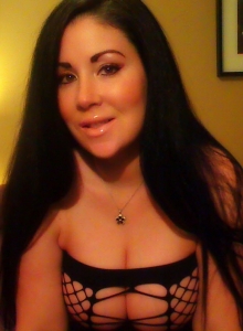 Sweet Krissy: Busty babe Sweet Krissy can barely keep her big juicy tits in her skimpy black fishnet top