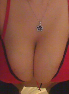 Sweet Krissy: Busty cock teasing Sweet Krissy shows off her ass when she pulls down her black panties