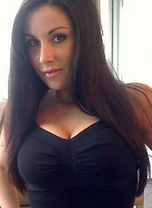 Sweet Krissy: Busty Sweet Krissy loves to show off her tight round ass and sexy legs in black boots