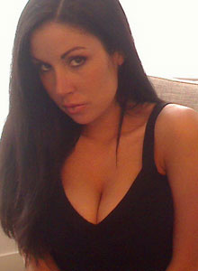 Sweet Krissy: Busty Sweet Krissy loves to show off her tight round ass and sexy legs in black boots