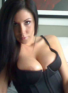 Sweet Krissy: Busty Sweet Krissy's huge juicy tits are almost popping out of her tight corset top