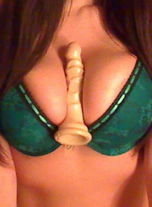 Sweet Krissy: Busty cock tease Sweet Krissy teases in her sexy green bra and almost sheer panties with her new dildo