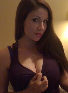 Sweet Krissy: Sweet Krissy loves to tease with her big juicy tits and tight round ass in a matching purple bra and panties