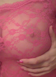 Sweet Krissy: The very busty Sweet Krissy teases with her big juicy tits in a sexy pink semi sheer lace top with matching pink g-string