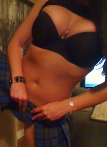 Sweet Krissy: Busty Sweet Krissy shows off her tight round perfect ass when she strips out of her