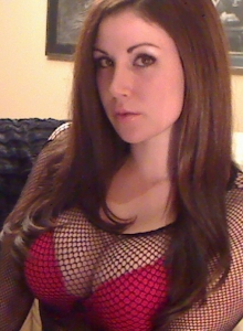 Sweet Krissy: Big breasted Sweet Krissy teases in a fishnet top with her big juicy tits