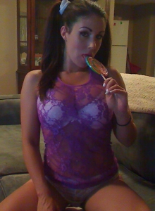 Sweet Krissy: Busty babe Sweet Krissy shows off her perfect round ass in a tiny white pair of booty shorts