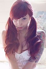Ivy Snow slowly undresses from her sexy white lace lingerie in front of a mirror