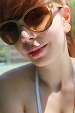 Ivy Snow has peeping tom on her while she sunbathes and decides to give them a show 