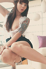 Ivy Snow makes your fantasy come true dressed in all white lingerie