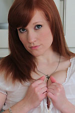 Lucy cums on top of her kitchen counter with the help of her vibrator