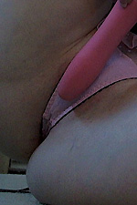 Lucy Ohara wears a sexy pink maid outfit with long black stockings and brings out her pink toy to play 