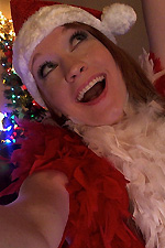 Lucy Ohara celebrates Christmas with her candy cane shaped dildo