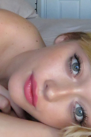 Madison Lain gets some play time in the morning with her glass dildo