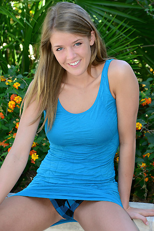 Sophia Winters masturbates with her dildo after removing her tight blue dress