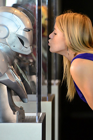 Sophia Winters wears a sexy dress and cums hard in front of Iron Man statues