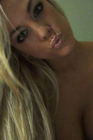 xoGisele wears a tight leather dress and a micro thong while she has some fun with handcuffs and invites you to join in