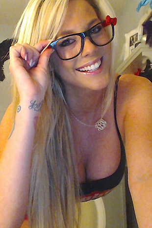 Gisele is a naughty nerd while she shows off her huge tits and perky ass while wearing glasses