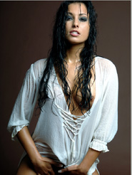 Addictive - Anetta Keys is posing nude in her wet white shirt. Take a look in her deep seductive dark eyes and and let yourself be captivated by her sensual moves.