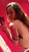 Anastasia Harris strips from her animal print and pink outfit