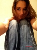 Anastasia Harris plays with her tight jeans and peels them off