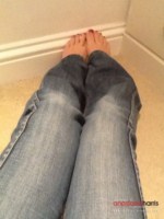 Anastasia Harris plays with her tight jeans and peels them off