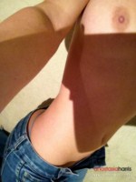 Anastasia Harris plays with her tight jeans and peels them off