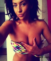 Gracie Lewis plays about at home in her bikini