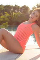 Geena Mullins strips and gets wet in the pool