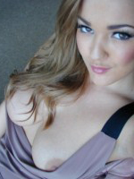 Jodie Gasson looks stunning in her loose dress and stocking