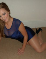 Jodie Gasson in her tight blue dress and panty hoes