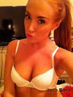 Lucy Anne in her white lingerie alone in her bedroom