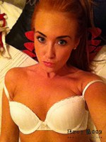 Lucy Anne in her white lingerie alone in her bedroom